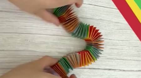 De cartón de papel de color slinky