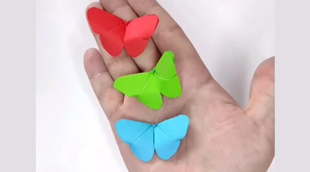 Lassen Sie uns Schmetterlinge mit Origami schaffen